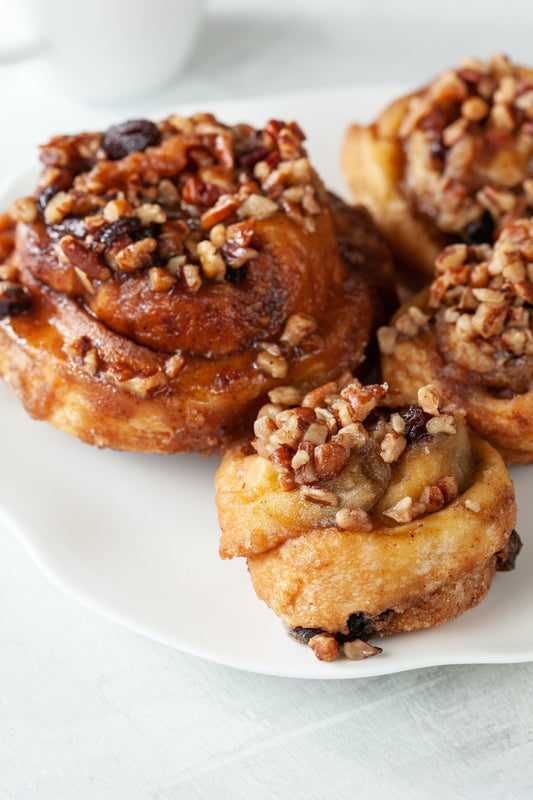 William Greenberg schnecken spiral sweet rolls feature pillowy dough swirled with cinnamon sugar and topped with sticky maple-pecan goodness