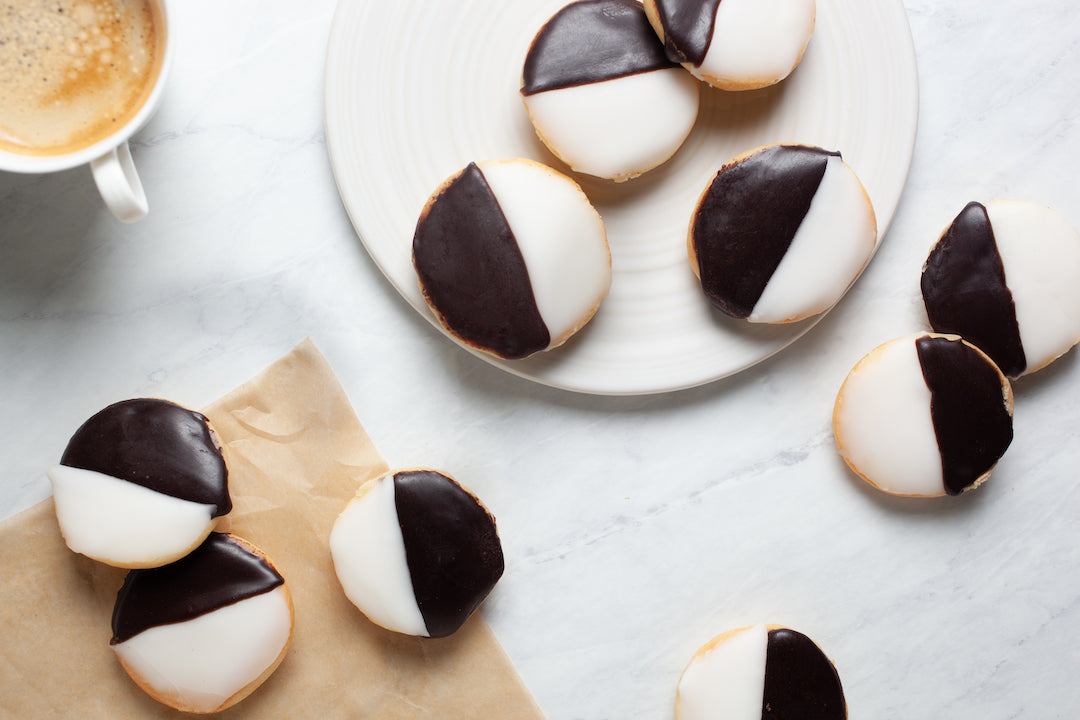 Soft, cake-like Black & White Cookie with fondant icing from William Greenberg Desserts, NYC’s #1 classic.