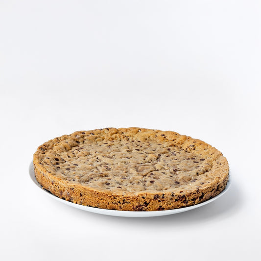 9" chcolate chip cookie cake on a white plate by William Greenberg Desserts