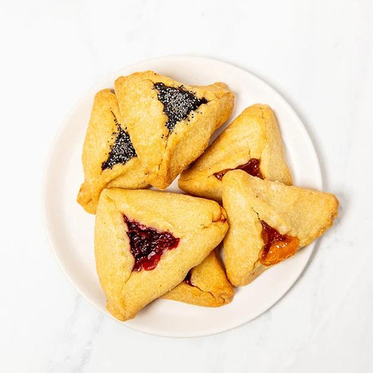 6 filled triangular pastries baed especially for the Jewish Purim holiday. 