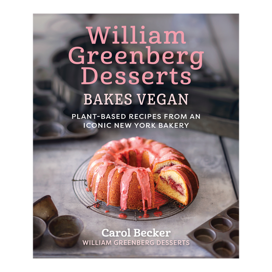 Book cover of 'William Greenberg Desserts Bakes Vegan' with a cake on a table.