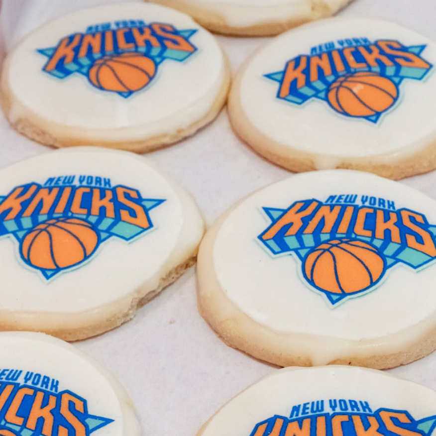 Cookies with New York Knicks logo and basketball graphics on a white surface