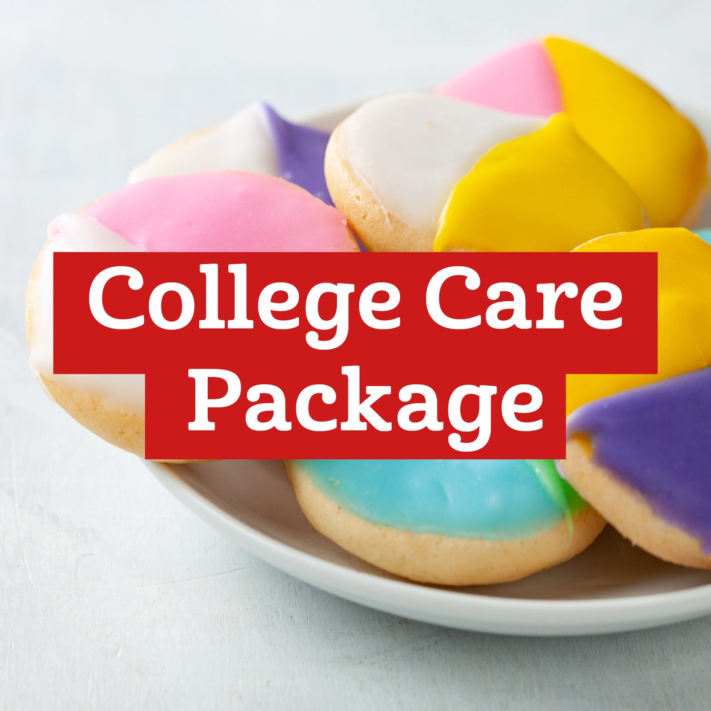 A plate of colorful black and white cookies with a label for the college care package